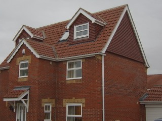 Side with tiled gable
